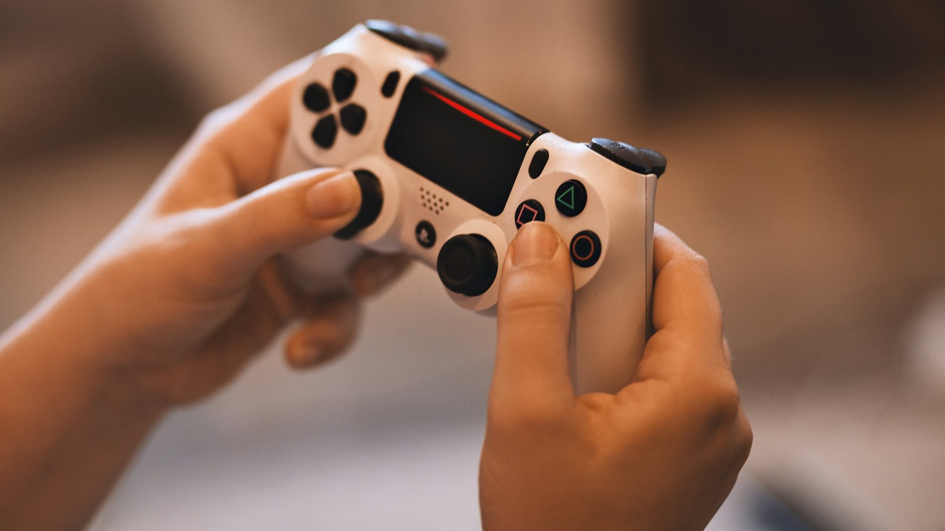 sony ps4 playstation 4 controller Person Holding Sony Ps4 Controller