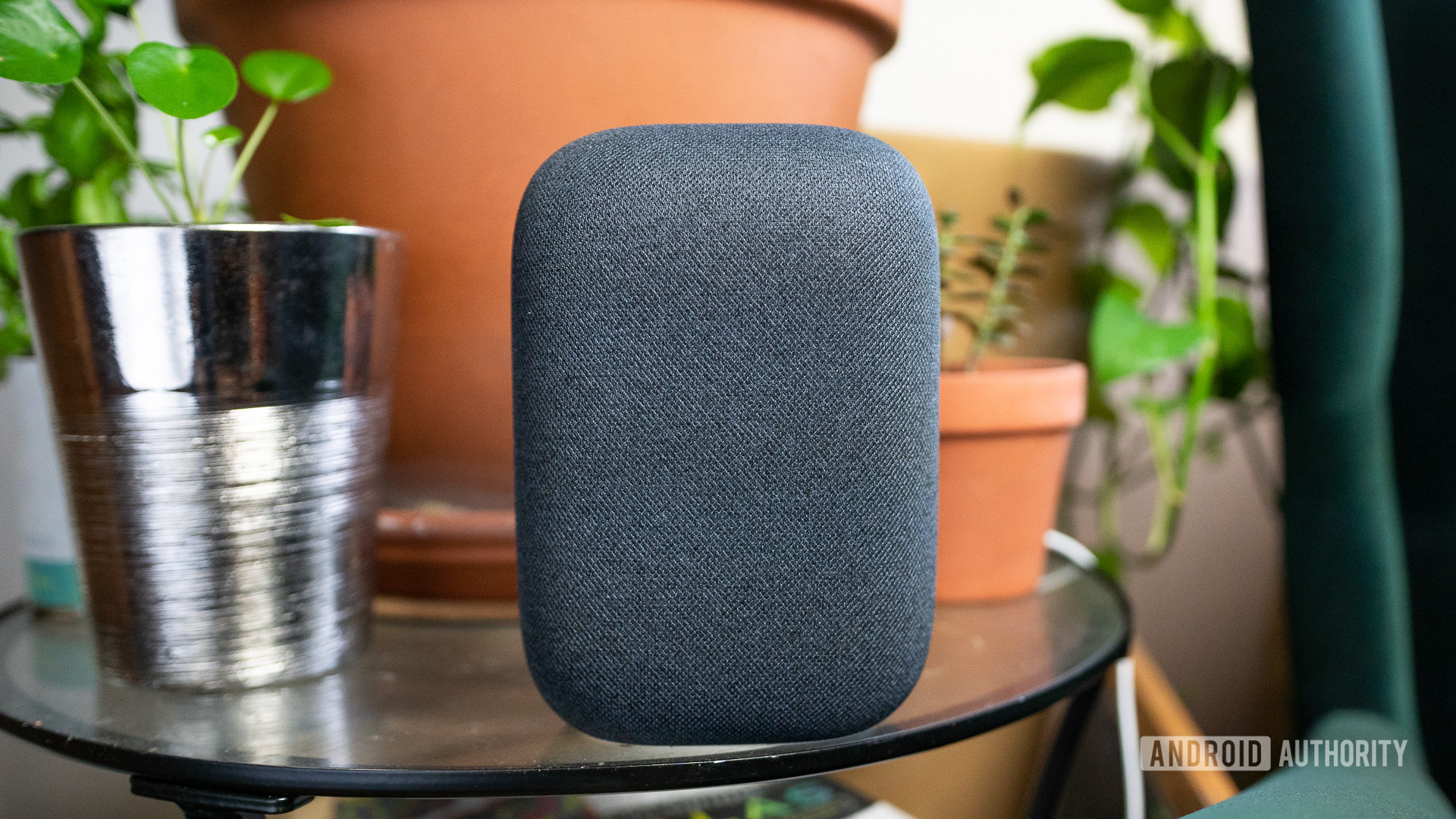 Google Nest Audio minimal design Google Nest Audio pictured on glass table with plants
