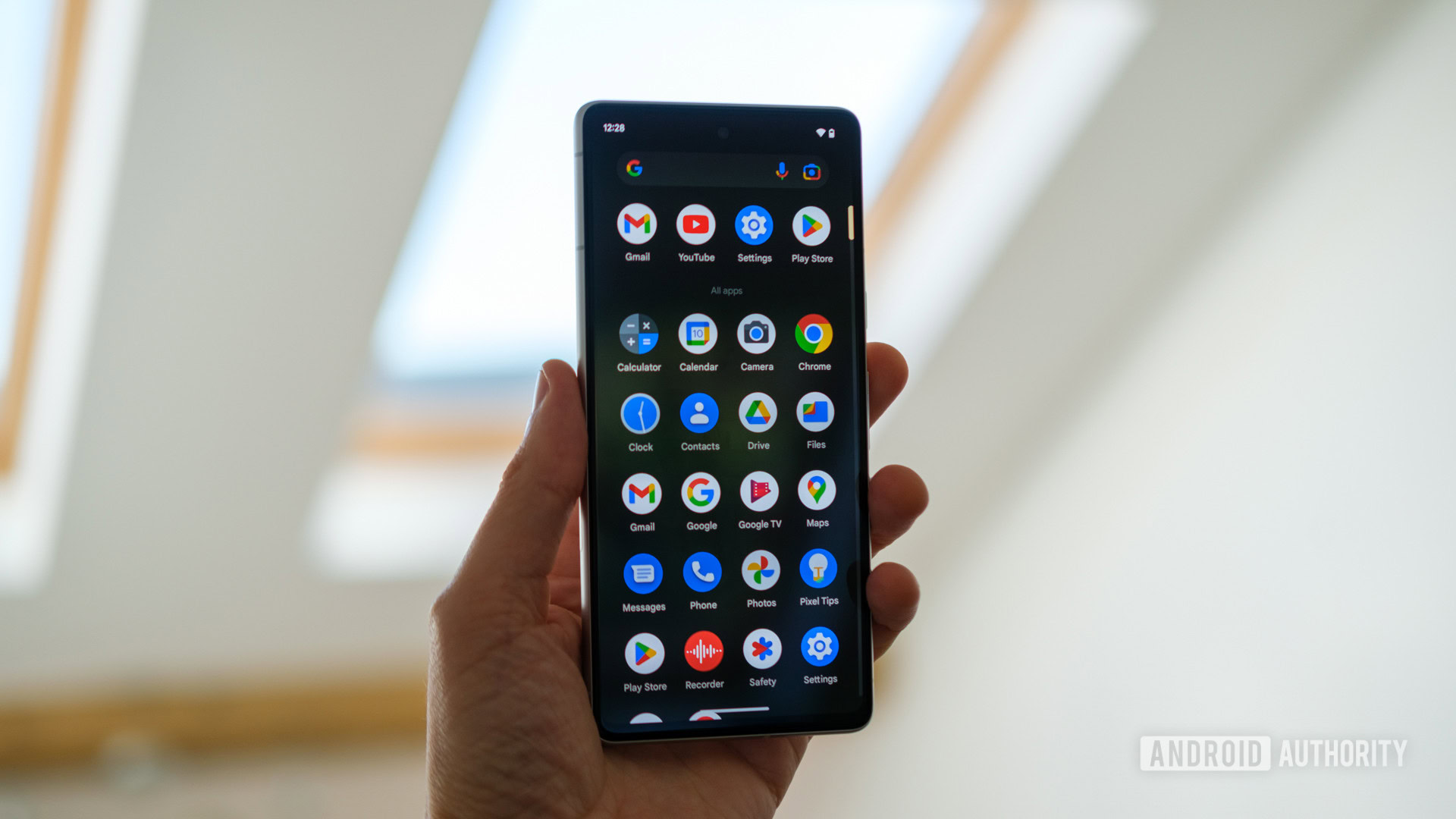 Google Pixel 7 app drawer Google Pixel 7 in hand showing app drawer