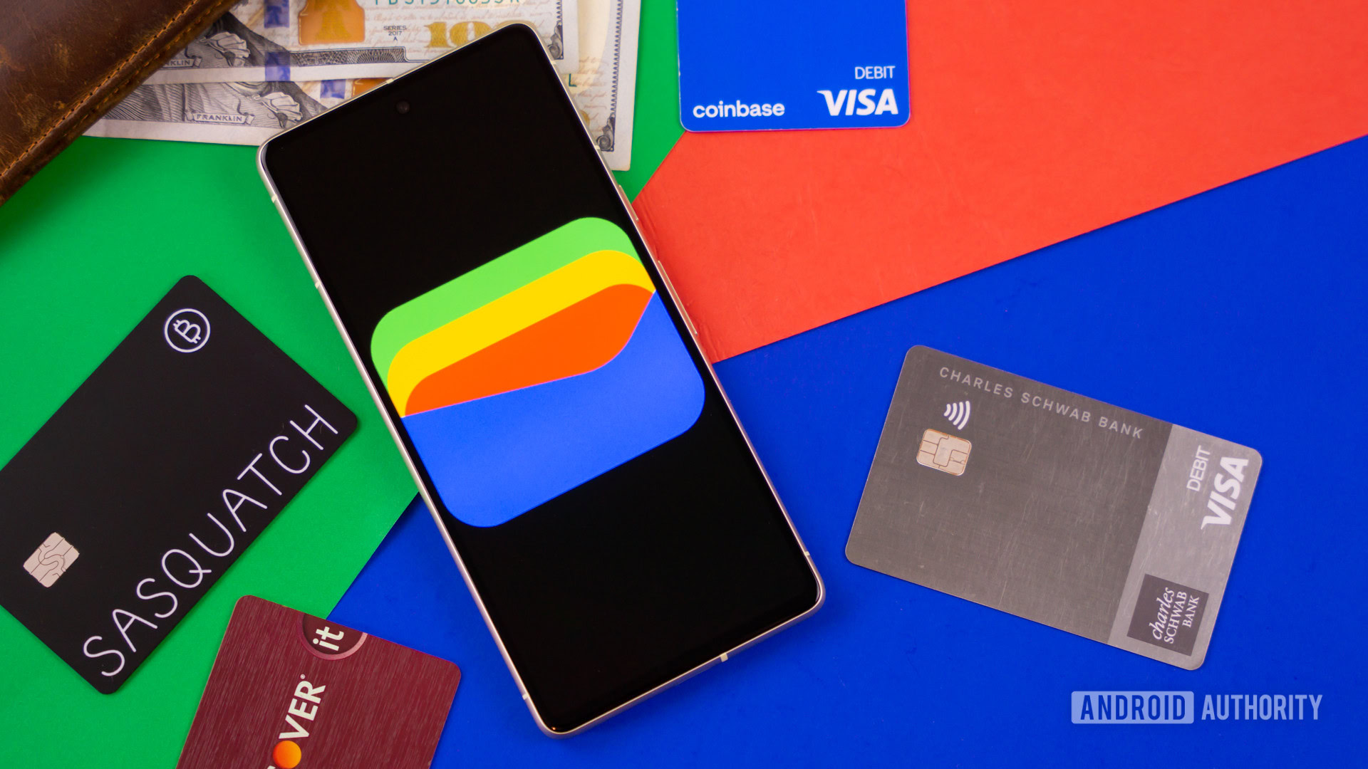 Google Wallet logo on smartphone next to credit cards and cash Stock photo 2 Google Wallet logo on smartphone next to credit cards and cash Stock photo 2
