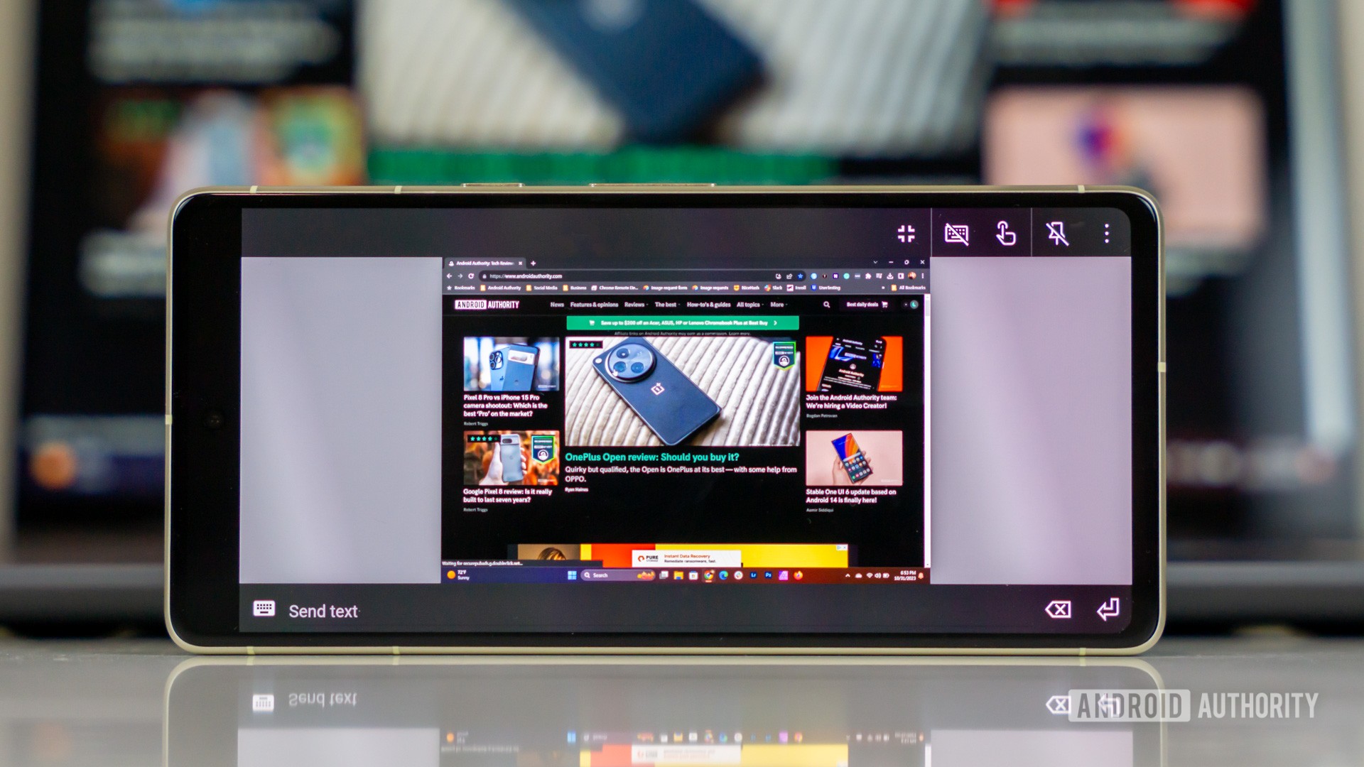 Chrome Remote Desktop running on smartphone, displaying a Windows screen, stock photo (2) Chrome Remote Desktop running on smartphone, displaying a Windows screen, stock photo (2)