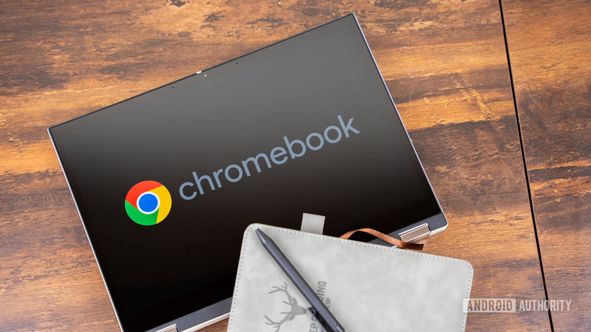 Chromebook with Chromebook logo on screen stock photo (16) Chromebook with Chromebook logo on screen stock photo (16)