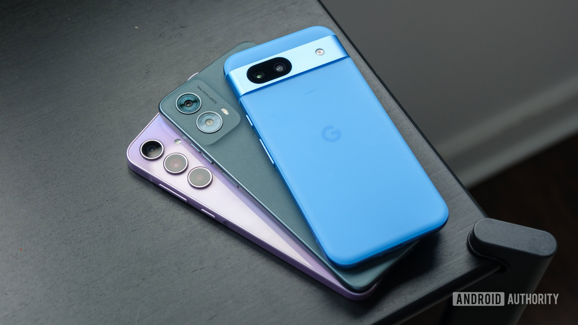 Samsung Galaxy A35 vs Moto G 5G vs Pixel 8a on table Samsung Galaxy A35 vs Moto G 5G vs Pixel 8a on table